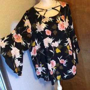 Black floral patterned top